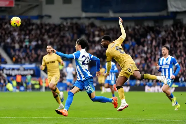 Brighton and Hove Albion's Kaoru Mitoma (left) battle for the ball with Crystal Palace's Jefferson Lerma during the Premier League match at the American Express Stadium, Brighton and Hove.