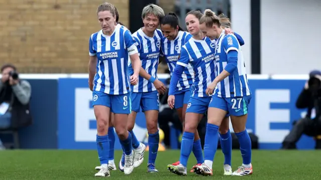 Brighton players celebrate