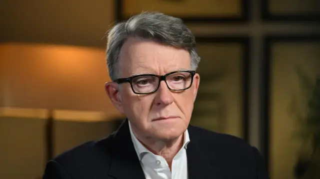 A file photo of Mandelson. He looks off camera during an interview
