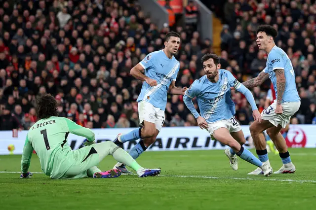 Bernardo Silva of Manchester City celebrates scoring his team's first goal during the Premier League match between Liverpool and Manchester City at Anfield on February 08, 2026 in Liverpool, England.