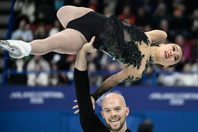 USA's Ellie Kam (above) and USA's Danny O'Shea (below) compete in the figure skating pair free skatin