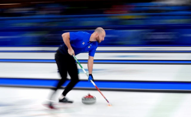 Italy's Amos Mosaner during the Curling Mixed Doubles Round Robin match on day two