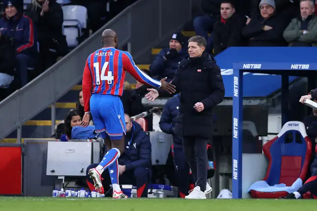 Jean-Philippe Mateta shaking hands with Oliver Glasner