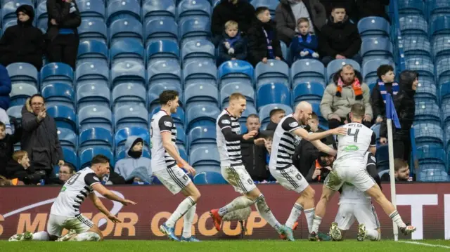 Queen's Park celebrate