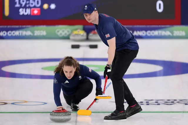 Jennifer Dodds of Team Great Britain competes with Bruce Mouat