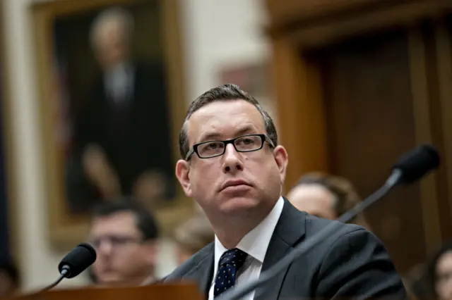 Joseph Edlow, wearing a grey suit over a white shirt, listens during a 2019 US House Judiciary Committee hearing