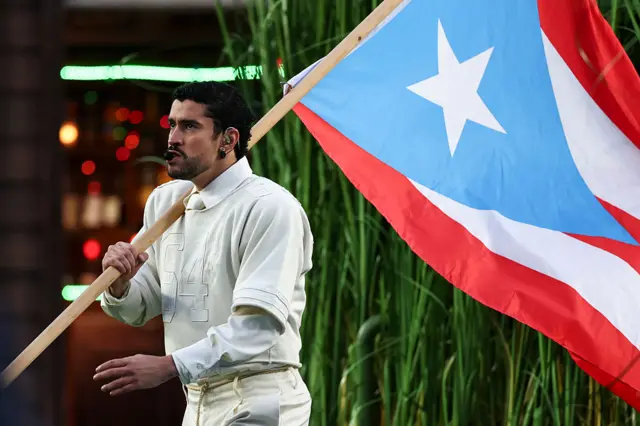 Bad Bunny with a Puerto Rico flag