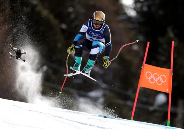 Barnabas Szollos of Team Israel skis as a drone follows him down the cours