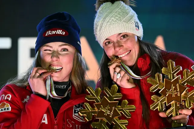 US' Mikaela Shiffrin (L) and US' Breezy Johnson celebrate during the medal ceremony