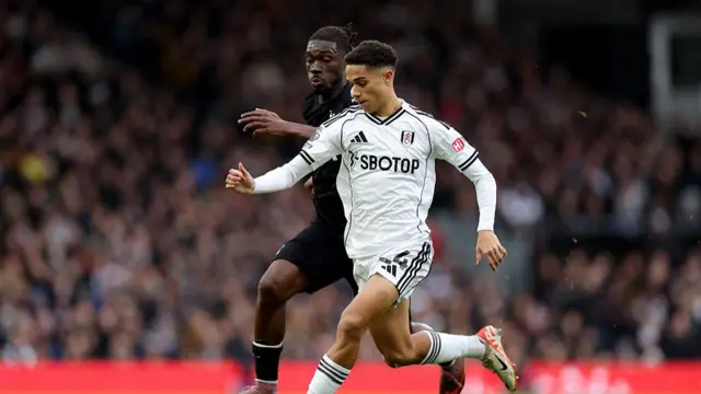 Joshua King of Fulham and Yves Bissouma of Tottenham Hotspur