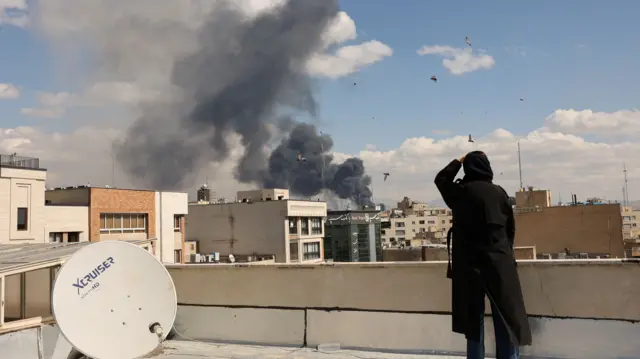 Smoke rises in Tehran on 1 March