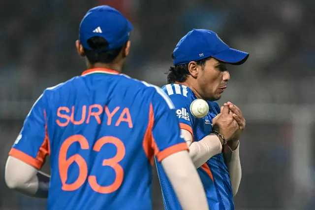 India's Abhishek Sharma (R) drops a catch of West Indies' Roston Chase as his captain Suryakumar Yadav watches during the 2026 ICC Men's T20 Cricket World Cup Super Eights match between India and West Indies at the Eden Gardens