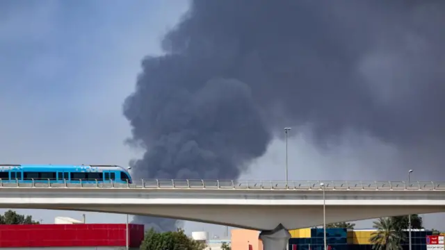 Smokes rise from Jebel Ali port in Dubai following an Iranian missile attack, United Arab Emirates