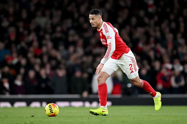 William Saliba of Arsenal runs with the ball