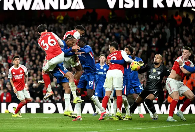 Jurrien Timber of Arsenal scores his team's second goal past Robert Sanchez