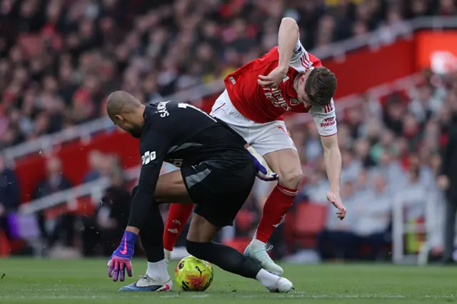 Viktor Gyokeres of Arsenal battles for possession with Robert Sanchez