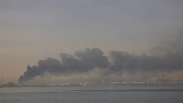 A plume of smoke rises from the port of Jebel Ali following a reported Iranian strike in Dubai on March 1, 2026.