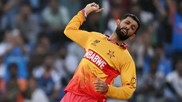 Sikandar Raza celebrates