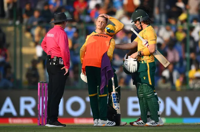Ryan Rickelton of South Africa reacts after being hit by a delivery during the ICC Men's T20 World Cup India & Sri Lanka 2026 Super 8 match between Zimbabwe and South Africa at Arun Jaitley Stadium on March 01, 2026 in Delhi, India.