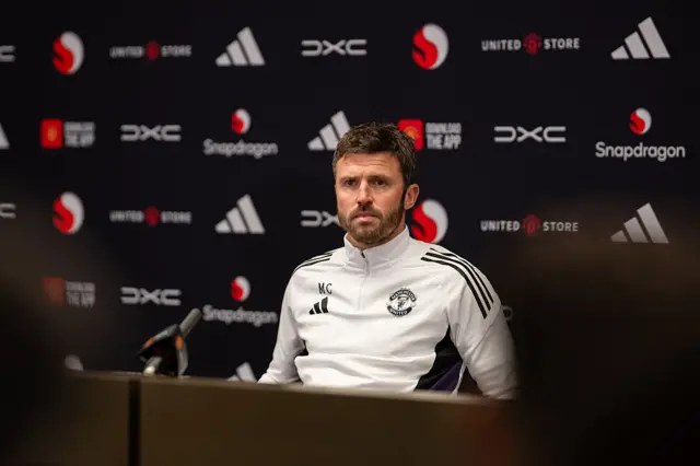 Michael Carrick at his news conference desk
