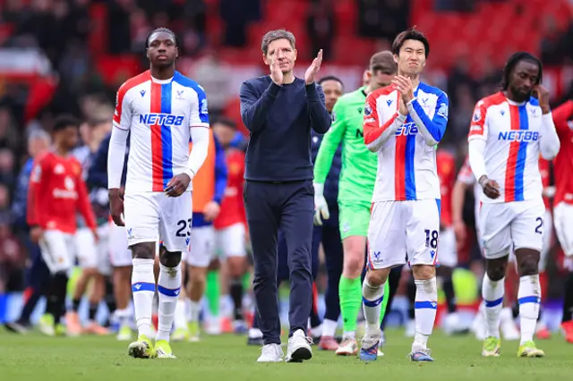 Crystal Palace manager Oliver Glasner applauds the support