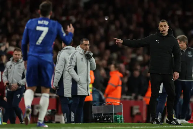 Pedro Neto (front L) reacts