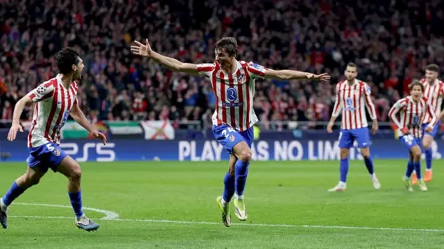 Robin Le Normand (2L) celebrates scoring his team's fourth goal