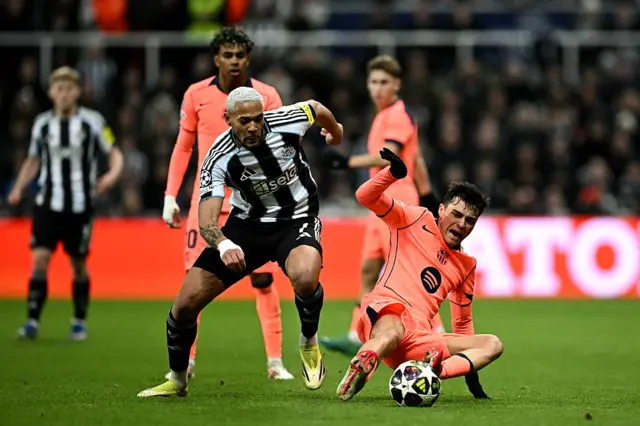 Joelinton challenging with Pedri