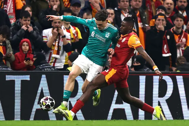 Florian Wirtz being challenged on the ball