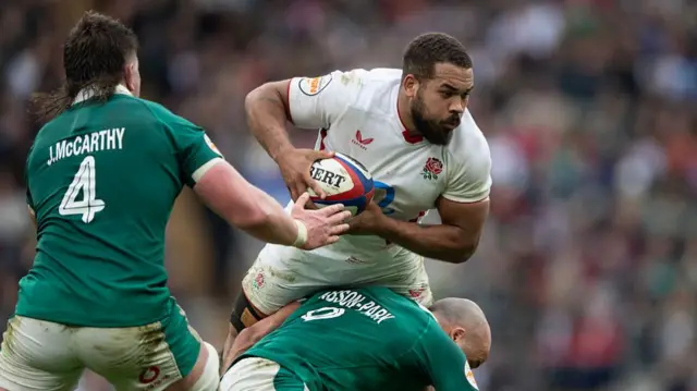 Ollie Lawrence in action against Ireland