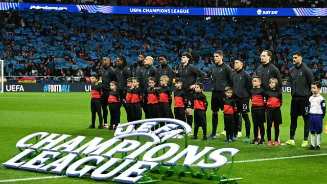 Tottenham Hotspur players line up before the UEFA Champions League