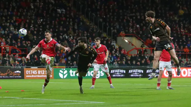 Lewis Koumas scores