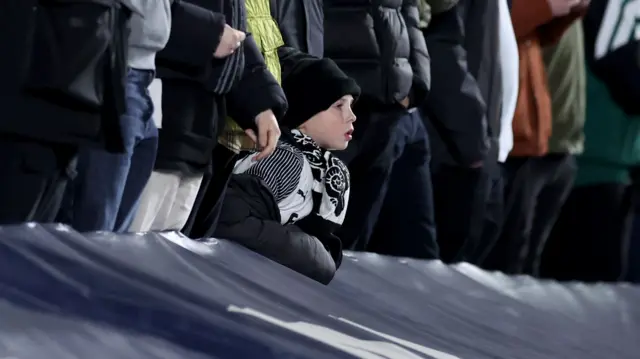 Young Derby fan in the stands