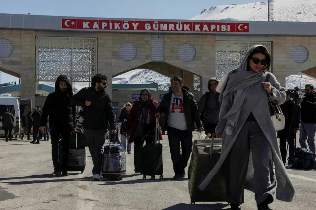 Iranians crossing into Turkey at the Kapikoy border crossing on Tuesday