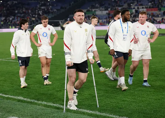 Tom Curry on crutches in Rome