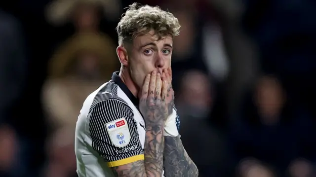 Sam Szmodics looks dejected