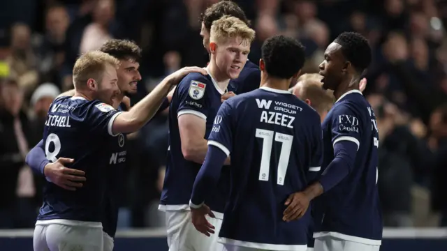Josh Coburn celebrates scoring for Millwall