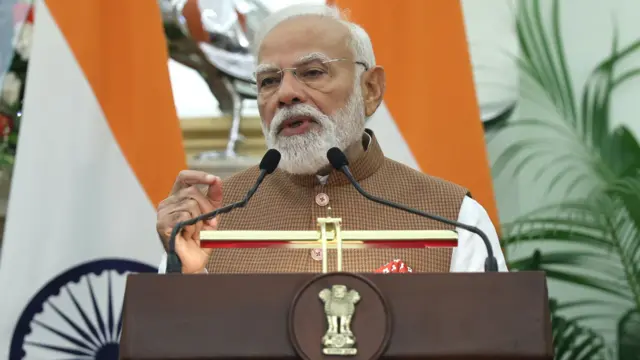 Indian Prime Minister Narendra Modi attends a press conference