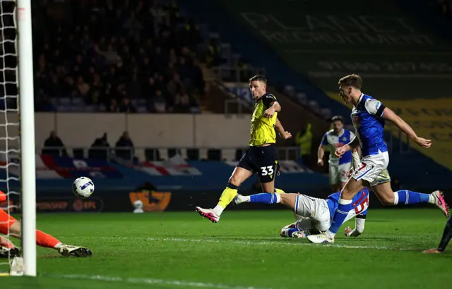 Jamie Donley of Oxford United scores
