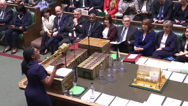 Kemi Badenoch is speaking in the House of Commons to the Labour benches where Keir Starmer, Rachel Reeves, David Lammy among others can be seen reacting