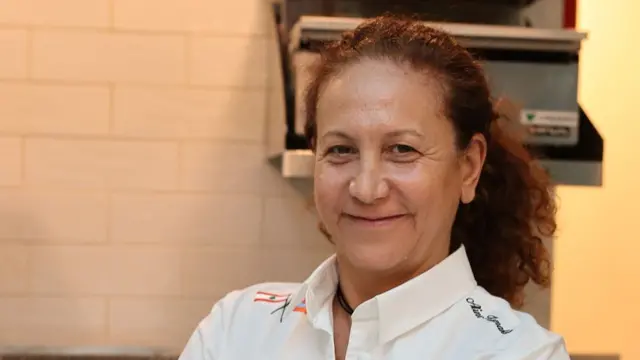 Restaurant owner Aline Karnakian pictured wearing a chef's shirt.