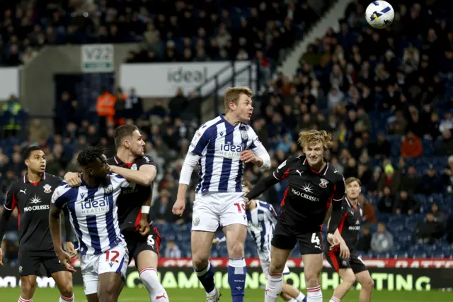 Aune Heggebo of West Bromwich Albion heads a shot at goal that is tipped over the bar by the Southampton keeper