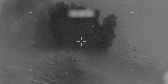 A still image of an explosion after a projectile hits an Iranian vessel, according to Us Central Command.
