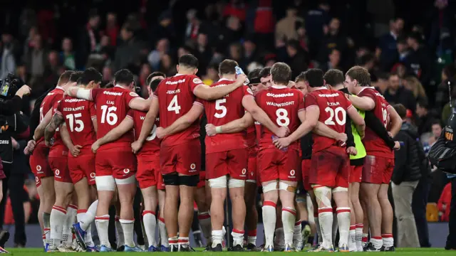 Wales huddle after Scotland game