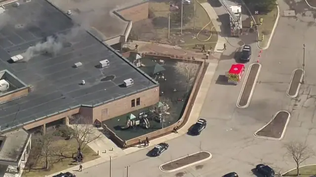 Smoke comes from a building