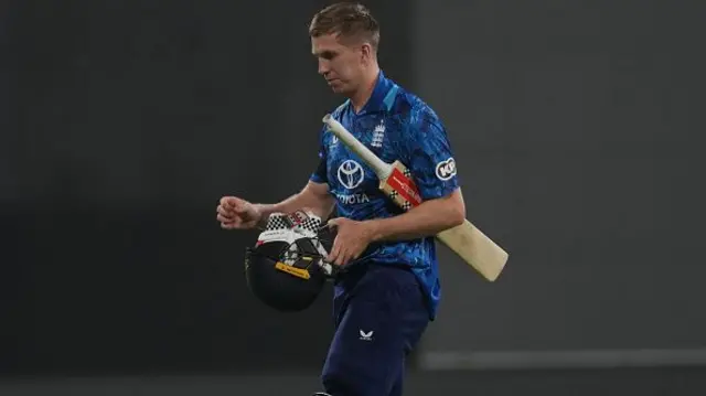 Zak Crawley of England walks back