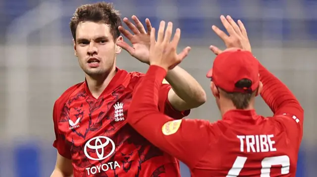 Scott Currie of England Lions celebrates with Asa Tribe of England