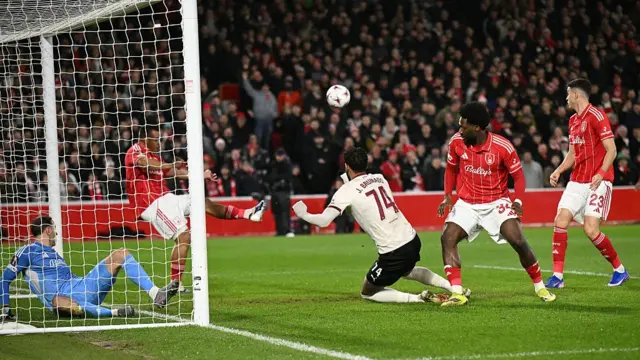 Nottingham Forest's Brazilian defender #05 Murillo clears the ball off the line from a shot by Midtjylland's Brazilian forward #74 Junior Brumado