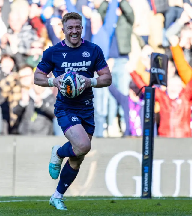 Scotland's Kyle Steyn breaks through to score his side's fifth try during a Guinness Six Nations match between Scotland and France at Scottish Gas Murrayfield,