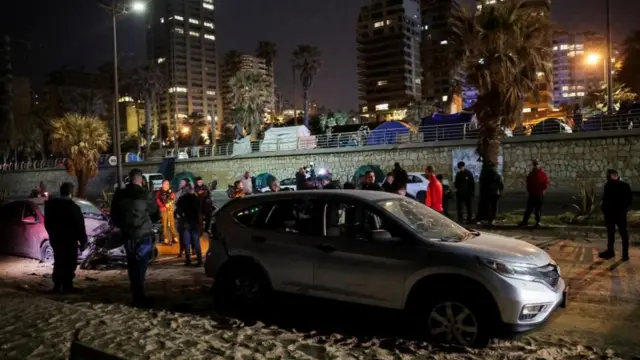 The aftermath of a strike on Beirut's seafront, pictured earlier today